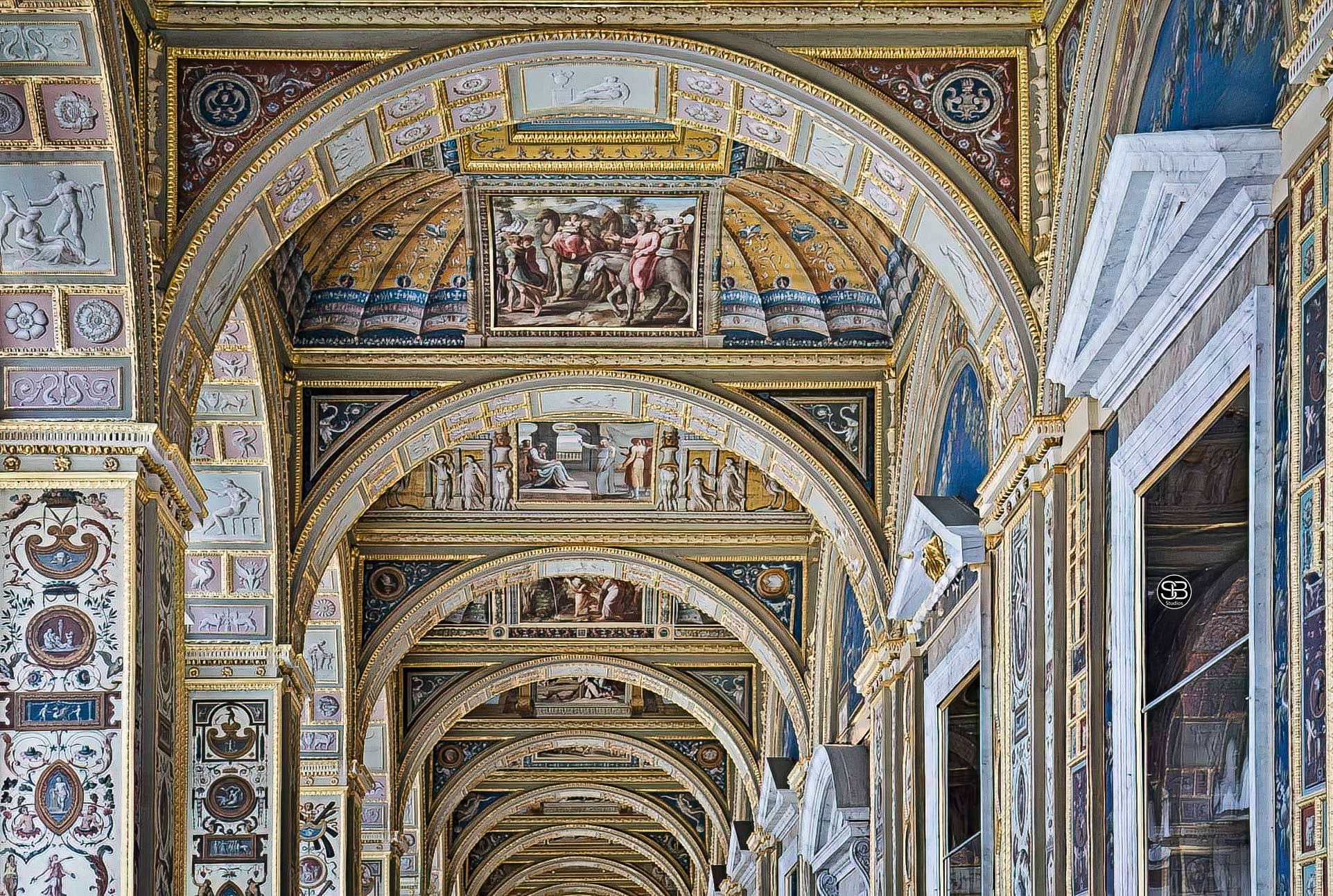 Baroque-Whispers—Gilded-Arcades-of-the-Hermitage—Raphael-Loggias-at-the-State-Hermitage-Museum-in-St.-Petersburg,-Russia-by-SB-Studios,-2024